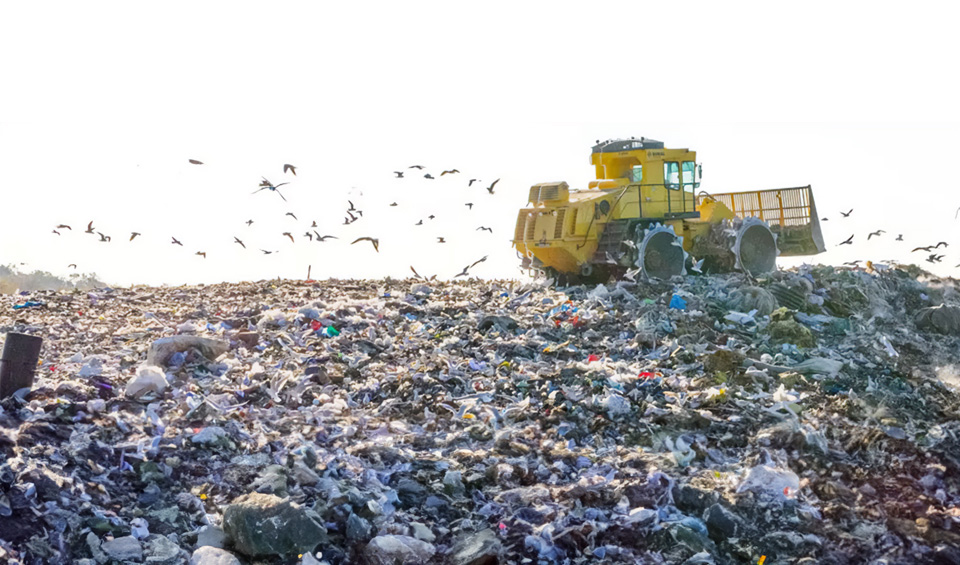 Image showing a compactor at a landfill